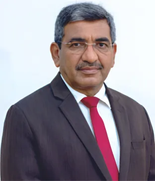 Portrait of Rakesh Sharma in formal attire