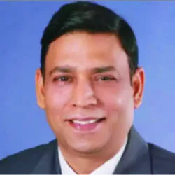 Portrait of Anil Bhardwaj in formal attire
