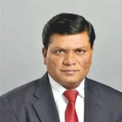 Portrait of Dr Milind Kamble in formal attire
