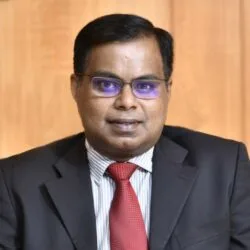 Portrait of Shaji K. V. in formal business attire
