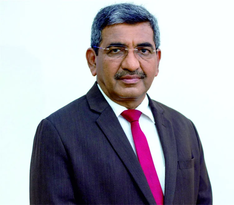 Portrait of Rakesh Sharma in formal attire