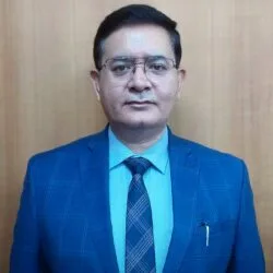 Portrait of Shri Dinesh Singh Rawat in formal attire