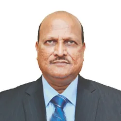 Portrait of Shri Kishor Kharat in formal attire
