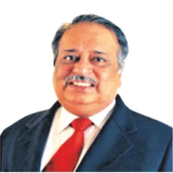 Portrait of Shri M. Damodaran in formal attire