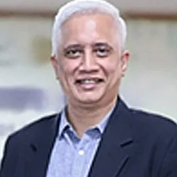Portrait of Shri Rahul Bhave in formal attire