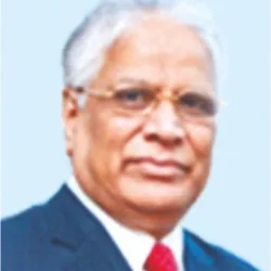 Portrait of an elderly man in a suit and red tie