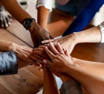 Hands stacked together symbolising teamwork
