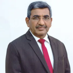 Portrait of Rakesh Sharma in formal attire