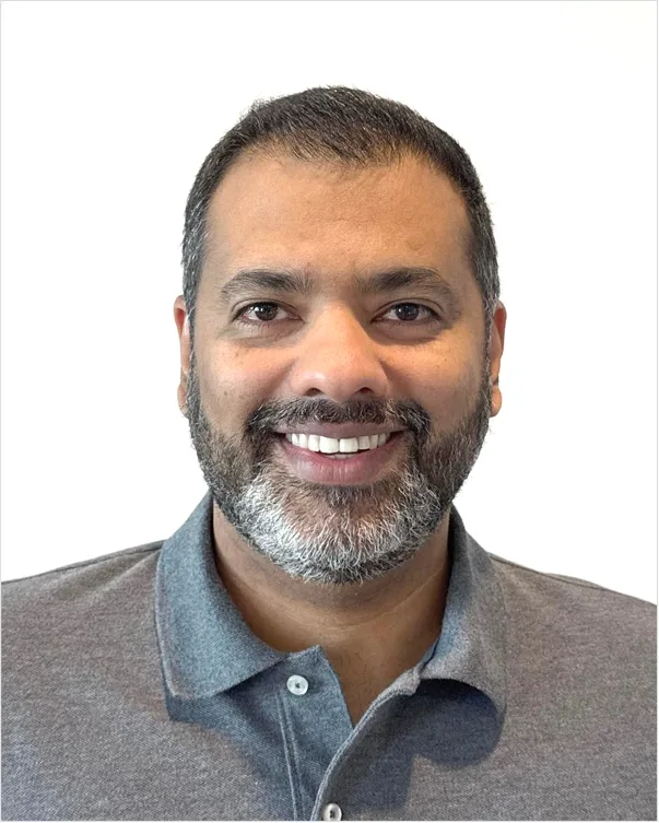 Portrait of a smiling man in a checked shirt