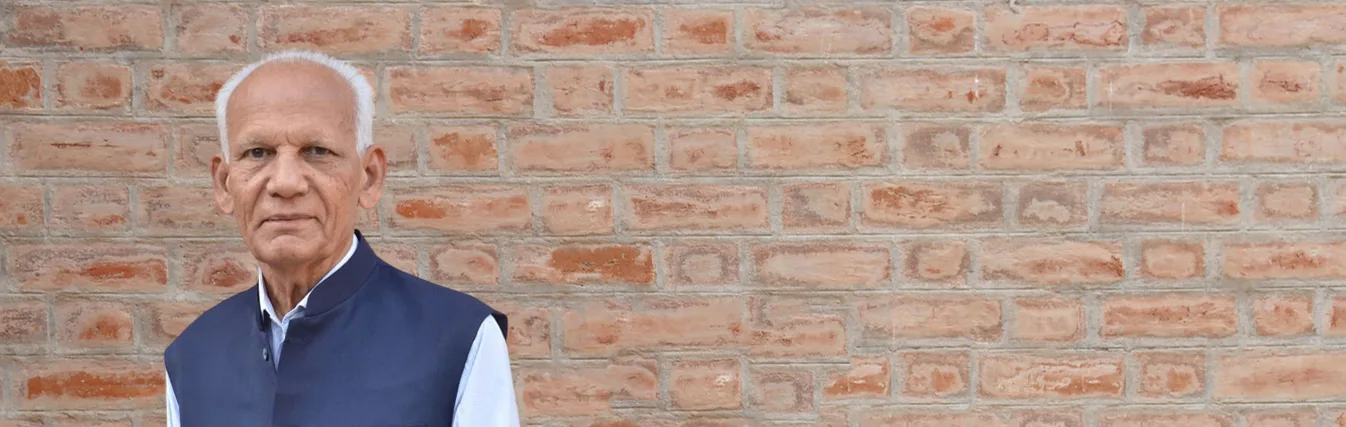 Portrait of a faculty member in a waistcoat
