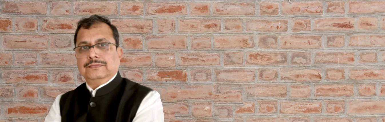 Portrait of a faculty member in a waistcoat