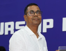 Man speaking at an entrepreneurship event