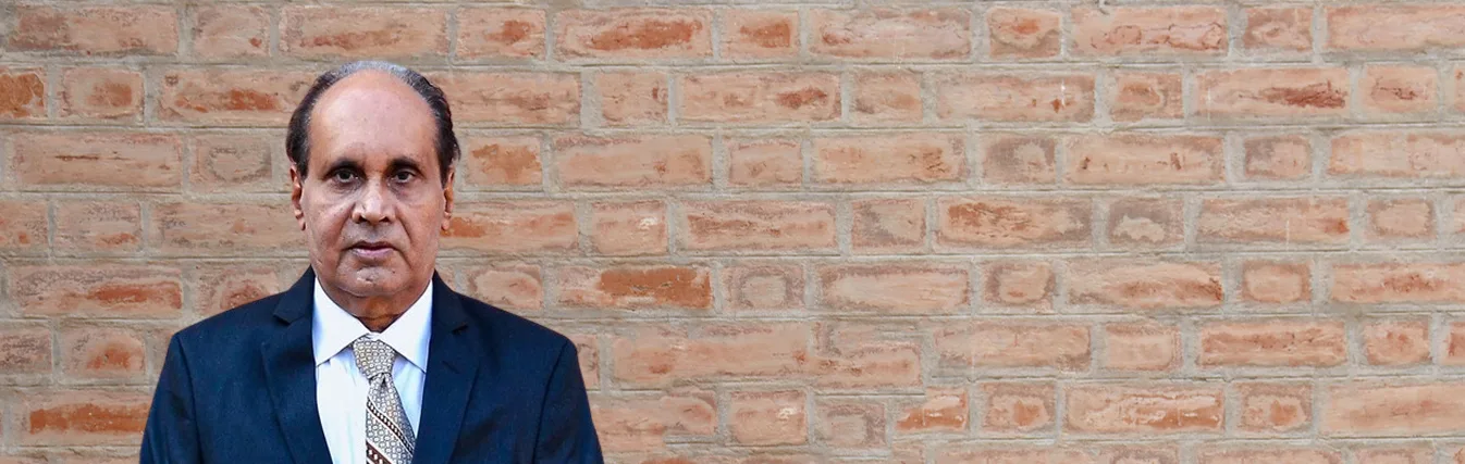 Portrait of a faculty member in a suit