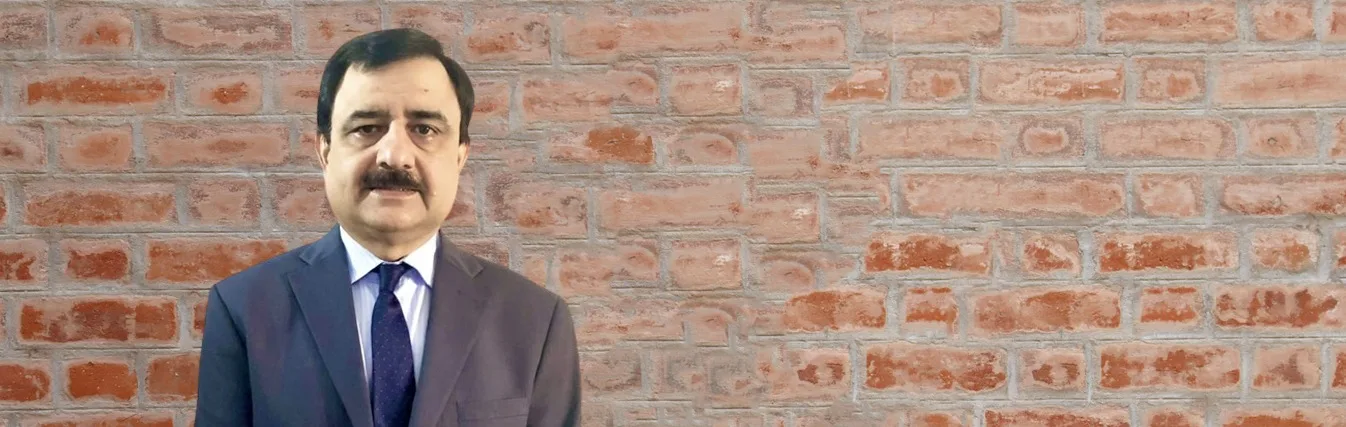 Man speaking in a video interview frame