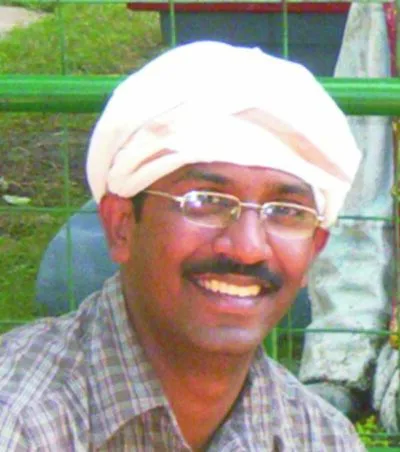 Smiling man wearing a turban