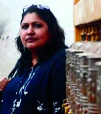 Woman standing at an exhibition stall