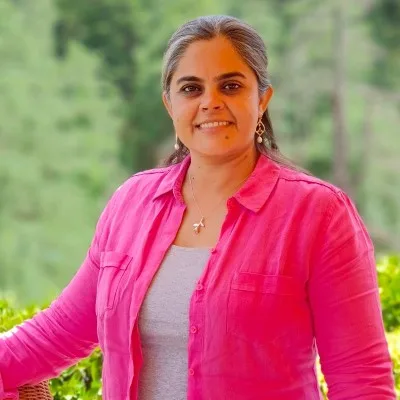 Portrait of a woman in a pink jacket