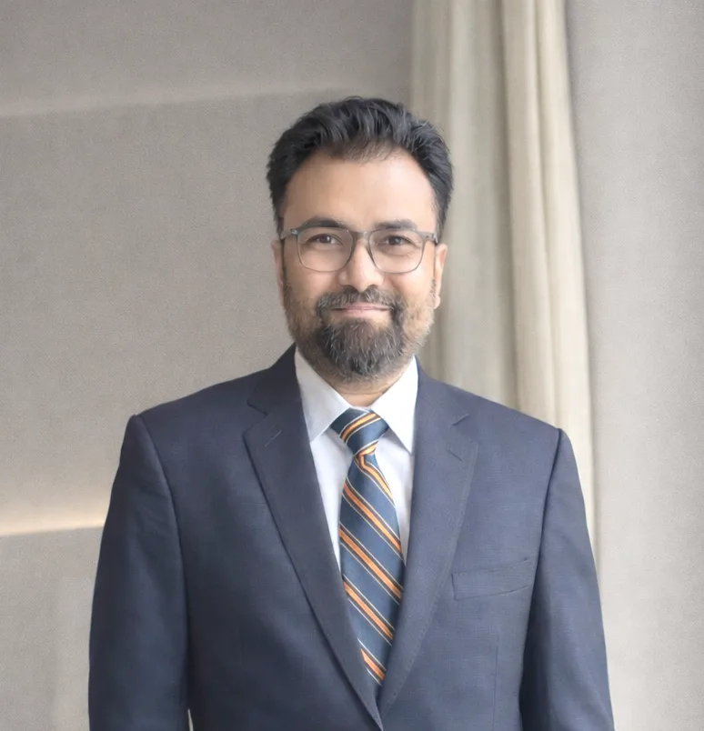 Portrait of Vivek Kataruka in formal attire