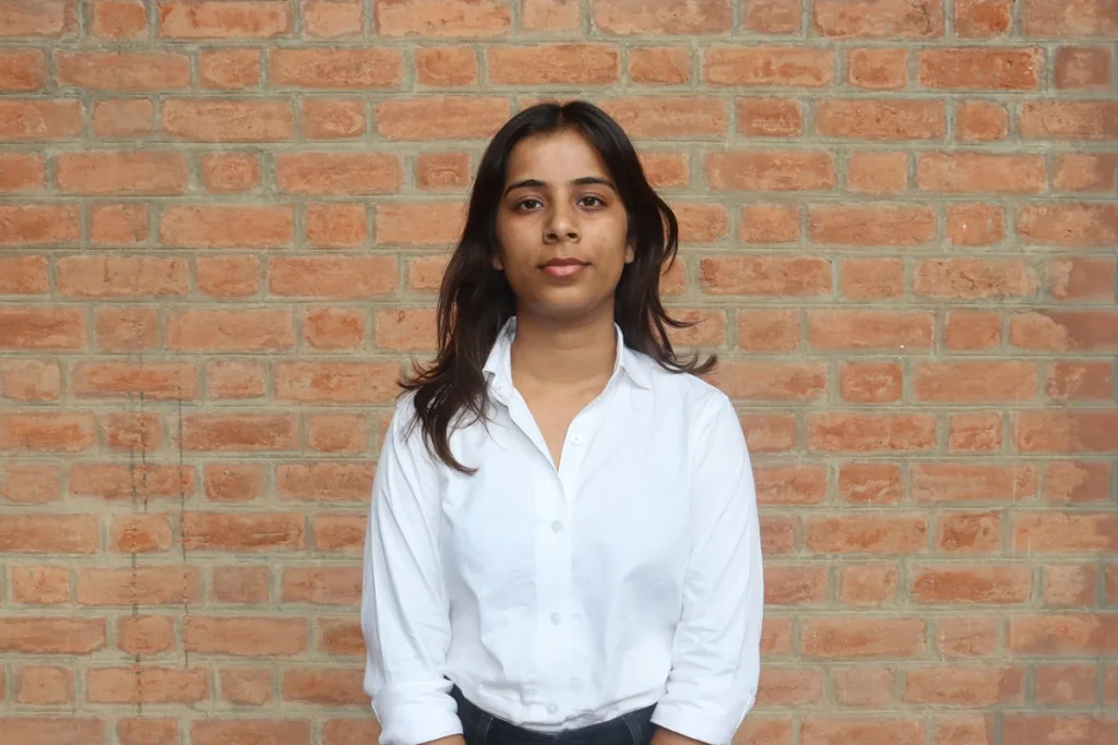 Portrait of a woman student in formal attire