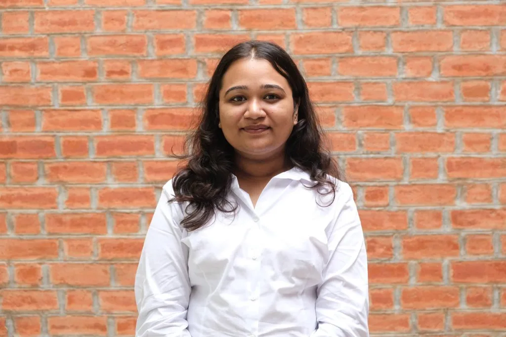 Portrait of a woman student in formal attire