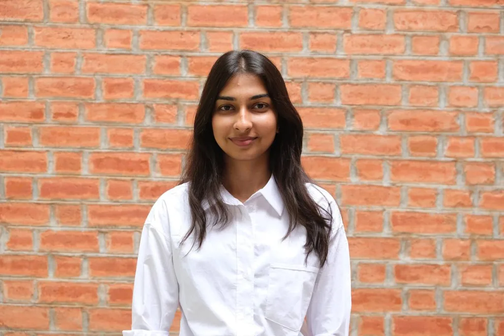 Portrait of a woman student in formal attire
