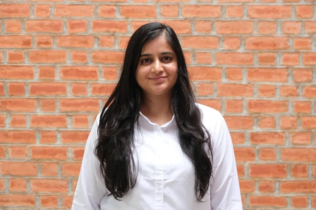 Portrait of a woman student in formal attire