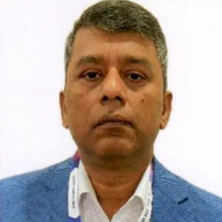Portrait of Shri Gopal Jha in formal attire