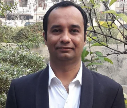 Portrait of Nilesh Sonaje in formal attire
